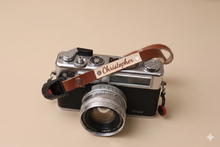 Load image into Gallery viewer, Personalized leather camera wrist strap on camera