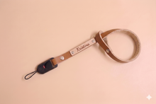 Load image into Gallery viewer, Personalized leather camera wrist strap with camera